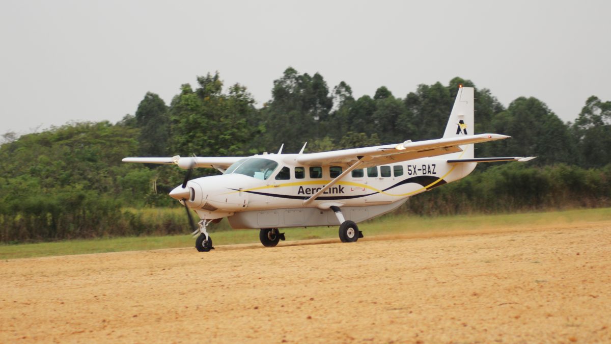Caravan aircraft taxiing on Kisoro Airstrip runway before passenger transfer to Rushaga and Nkuringo sectors of Bwindi Impenetrable National Park