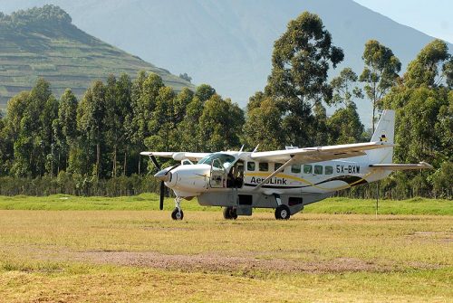 Cessna Caravan aircraft taxing at Kisoro Airstrip used for domestic flights during Uganda safari tours in 2026
